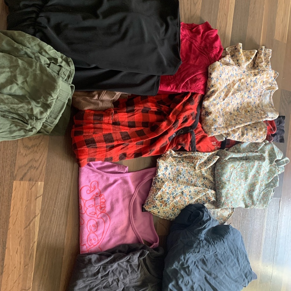 A bundle. Shorts, sweatshirt, shirts, romper, pink onesie